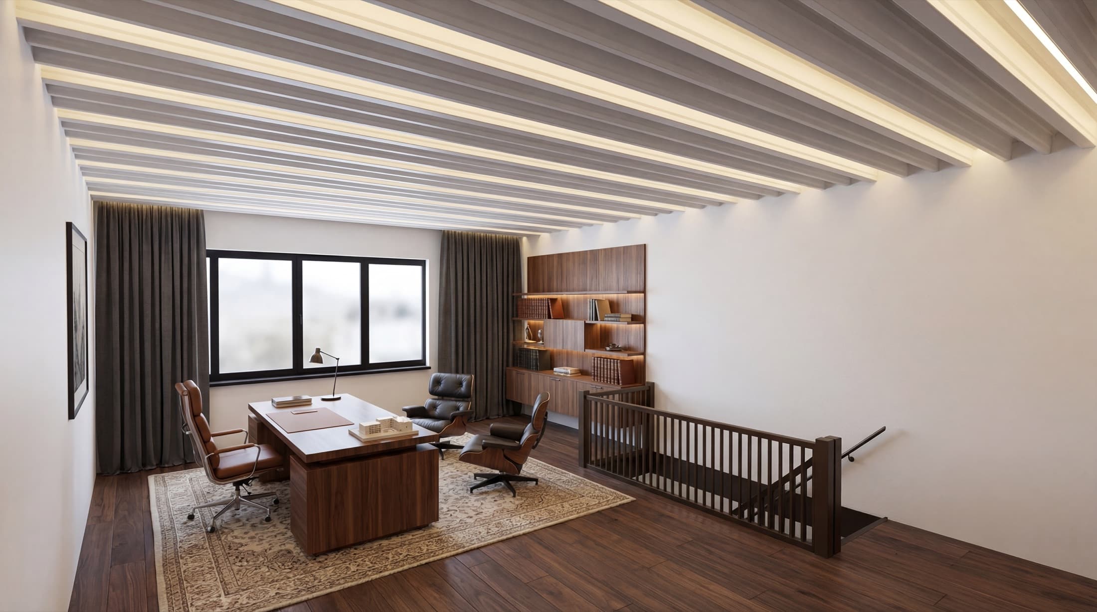 Verdieping ingericht als kantoor met bureau, fauteuil en boekenwand