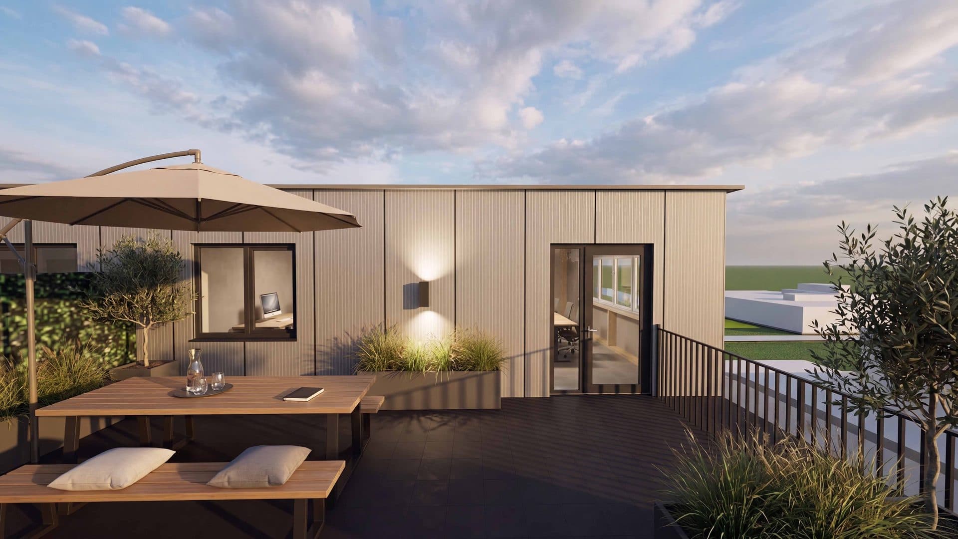 Eigen dakterras van de XXL-unit met loungeset en beplanting